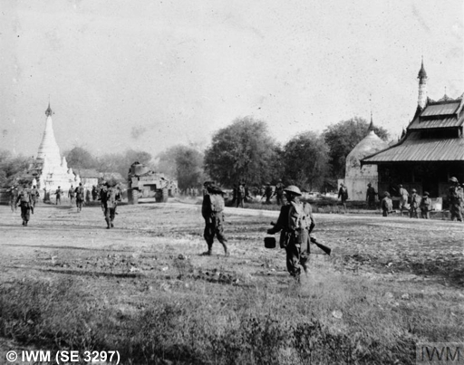 Infantry of 19th Indian Division supported by Lee tanks advance into Mandalay